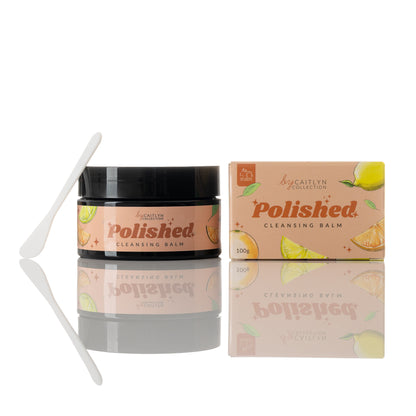 A product image showing a jar of Polished cleansing balm next to its packaging box, with a spoon for application. The packaging has a citrus design and text indicating the product is for 'Polished cleansing balm'.